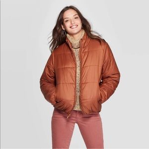 Brand new women’s puffer size M